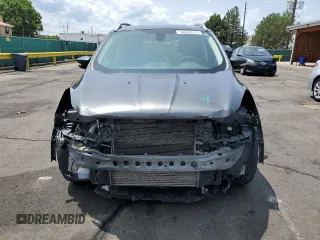 2015 Ford Escape Titanium with VIN 1FMCU9J98FUB49112, listed as a Copart auction lot 58989915 with 94,060 mi miles and Salvage title. Bid and sale history available at DreamBid. Image 5.