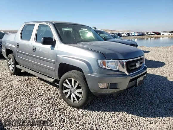 2009 Honda Ridgeline RT z VIN 5FPYK16259B104131, wystawiony jako Copart lot #46912055 z przebiegiem 75 116 mil mil oraz Szkoda całkowita • Salvage title. Historia ofert i sprzedaży dostępna na DreamBid. Obrazek 11.