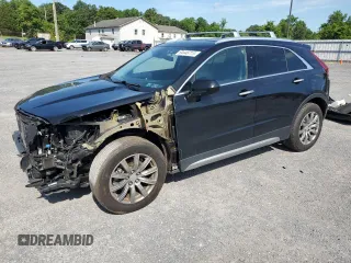 2019 Cadillac XT4 FWD Premium Luxury with VIN 1GYFZCR49KF219556, listed as a Copart auction lot 64446715 with 54,942 mi miles and Salvage title. Bid and sale history available at DreamBid. Image 1.