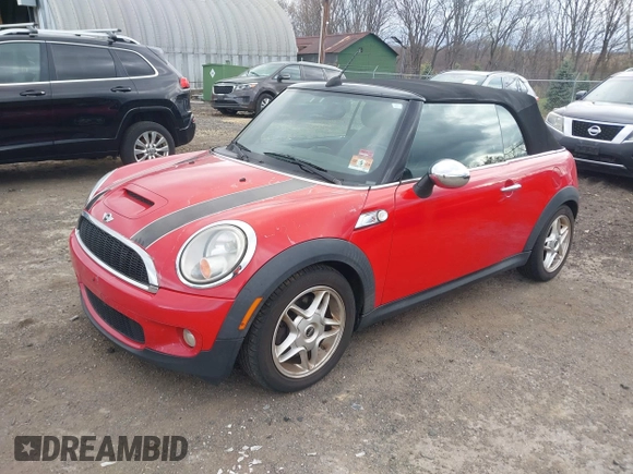 2010 MINI Convertible S with VIN WMWMS3C58ATY09229, listed as a IAAI auction lot 42055305 with 142,396 mi miles and . Bid and sale history available at DreamBid. Image 2.