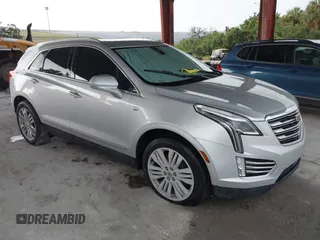 2018 Cadillac XT5 Premium Luxury FWD z VIN 1GYKNERS7JZ214504, wystawiony jako IAAI lot #40067507 z przebiegiem Nie podano mil oraz . Historia ofert i sprzedaży dostępna na DreamBid. Obrazek 1.