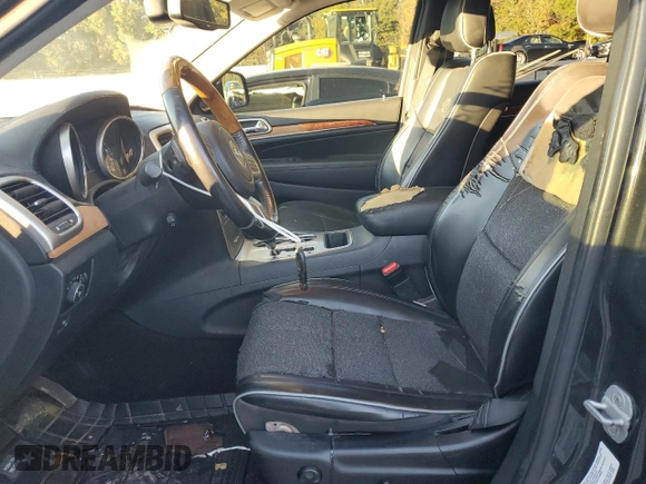 2011 Jeep Grand Cherokee Overland with VIN 1J4RS6GG0BC557302, listed as a Copart auction lot 83851734 with 195,443 mi miles and Salvage Title. Bid and sale history available at DreamBid. Image 7.