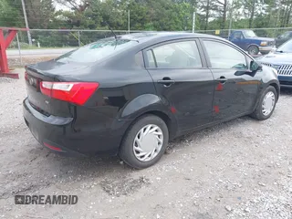 2013 Kia Rio LX with VIN KNADM4A35D6270556, listed as a IAAI auction lot 42115208 with 165,249 mi miles. Bid and sale history available at carsss.com. Image 4.