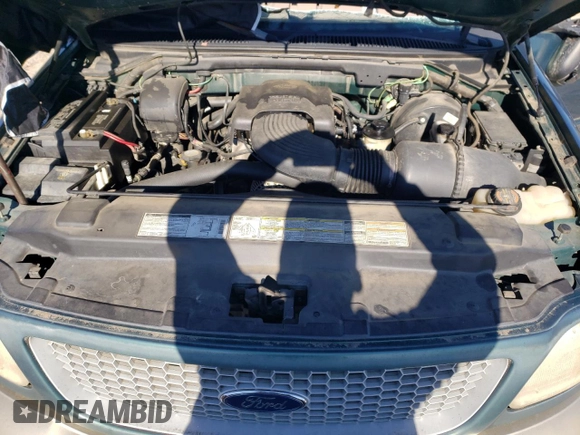 1999 Ford F-150 с VIN 1FTRX18W7XNA31048, выставлен на аукционе Copart как лот 87051164 с пробегом Не указан миль и Списание • Salvage title. История ставок и продаж доступна на DreamBid. Изображение 12.