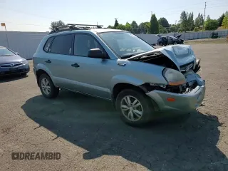 2009 Hyundai Tucson GLS with VIN KM8JM12B29U953176, listed as a Copart auction lot 70141174 with 77,132 mi miles and Salvage Title. Bid and sale history available at carsss.com. Image 12.