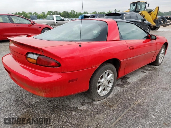2002 Chevrolet Camaro z VIN 2G1FP22K322135404, wystawiony jako Copart lot #58767305 z przebiegiem Nie podano mil oraz Czysty tytuł • Clean title. Historia ofert i sprzedaży dostępna na DreamBid. Obrazek 3.