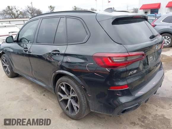 2022 BMW X5 sDrive40i with VIN 5UXCR4C07N9M28669, listed as a IAAI auction lot 41543581 with 59,497 mi miles. Bid and sale history available at carsss.com. Image 3.