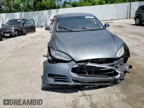 2014 Tesla Model S 60 z VIN 5YJSA1H13EFP36058, wystawiony jako Copart lot #57041725 z przebiegiem Nie podano mil oraz Szkoda całkowita • Salvage title. Historia ofert i sprzedaży dostępna na DreamBid. Obrazek 13.