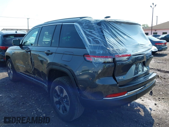 2022 Jeep Grand Cherokee with VIN 1C4RJYB67N8716360, listed as a IAAI auction lot 42464479 with 17,208 mi miles and . Bid and sale history available at DreamBid. Image 3.