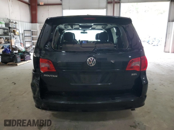 2012 Volkswagen Routan z VIN 2C4RVADG0CR355752, wystawiony jako Copart lot #53687155 z przebiegiem 132 903 mil mil oraz Szkoda całkowita • Salvage title. Historia ofert i sprzedaży dostępna na DreamBid. Obrazek 6.