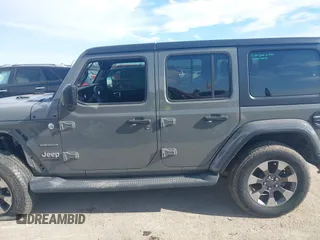 2018 Jeep Wrangler Unlimited Sahara z VIN 1C4HJXEN9JW215890, wystawiony jako IAAI lot #41215063 z przebiegiem 39 567 mil mil oraz . Historia ofert i sprzedaży dostępna na DreamBid. Obrazek 14.