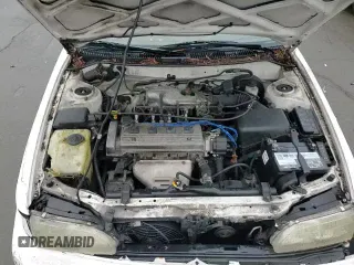 1996 Toyota Corolla z VIN JT2EB02E5T0114453, wystawiony jako Copart lot #85075524 z przebiegiem 193 798 mil mil oraz Szkoda całkowita • Salvage title. Historia ofert i sprzedaży dostępna na DreamBid. Obrazek 13.