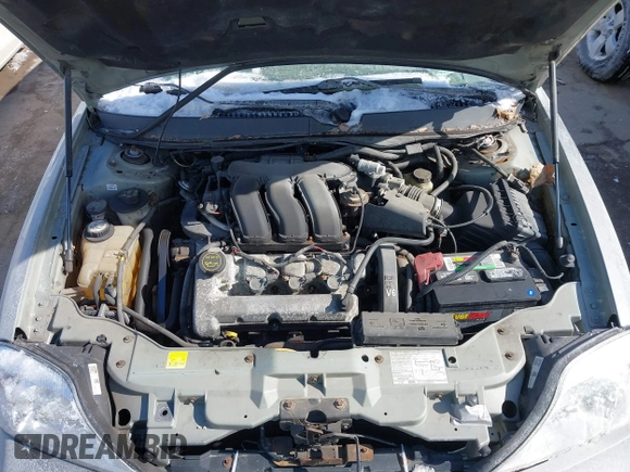 2004 Mercury Sable LS Premium z VIN 1MEFM59S64A608491, wystawiony jako IAAI lot #41599768 z przebiegiem 183 667 mil mil oraz . Historia ofert i sprzedaży dostępna na DreamBid. Obrazek 10.