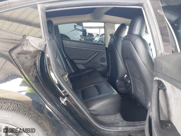 2022 Tesla Model 3 Long Range with VIN 5YJ3E1EBXNF185973, listed as a IAAI auction lot 41692577 with 131,513 mi miles. Bid and sale history available at carsss.com. Image 8.