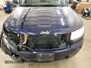 2012 Jeep Grand Cherokee Laredo with VIN 1C4RJFAG9CC221229, listed as a Copart auction lot 52035545 with 70,332 mi miles and Salvage Title. Bid and sale history available at carsss.com. Image 12.