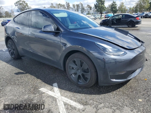 2024 Tesla Model Y z VIN 7SAYGDED1RF089192, wystawiony jako Copart lot #48752085 z przebiegiem 7 643 mil mil oraz Szkoda całkowita • Salvage title. Historia ofert i sprzedaży dostępna na DreamBid. Obrazek 4.