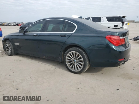 2011 BMW 7 Series 750i with VIN WBAKA8C56BCY36955, listed as a Copart auction lot 41576495 with 131,550 mi miles and Clean title. Bid and sale history available at DreamBid. Image 2.