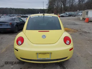2009 Volkswagen New Beetle Coupe S with VIN 3VWPW31C59M518880, listed as a IAAI auction lot 41201971 with 99,976 mi miles. Bid and sale history available at carsss.com. Image 16.