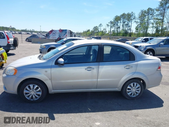 2007 Chevrolet Aveo LS with VIN KL1TD56617B098732, listed as a IAAI auction lot 41889243 with 115,426 mi miles and . Bid and sale history available at DreamBid. Image 14.