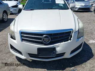 2013 Cadillac ATS with VIN 1G6AA5RX2D0150988, listed as a IAAI auction lot 42538612 with 212,037 mi miles and . Bid and sale history available at DreamBid. Image 19.