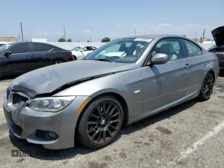 2012 BMW 3 Series 328i with VIN WBAKE5C51CJ106175, listed as a Copart auction lot 59755055 with 66,924 mi miles and Salvage title. Bid and sale history available at DreamBid. Image 1.