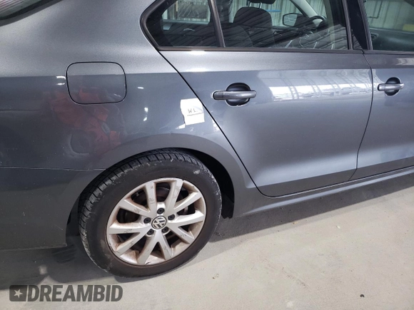 2015 Volkswagen Jetta SE с VIN 3VWD17AJ4FM325204, выставлен на аукционе Copart как лот 59141575 с пробегом Не указан миль и Списание • Salvage title. История ставок и продаж доступна на DreamBid. Изображение 12.