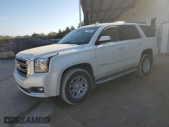 2015 GMC Yukon SLT with VIN 1GKS1BKCXFR563509, listed as a Copart auction lot 77188854 with 127,481 mi miles and Clean Title. Bid and sale history available at carsss.com. Image 1.
