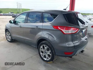 2013 Ford Escape SEL with VIN 1FMCU0HX8DUB61208, listed as a IAAI auction lot 42575283 with 140,330 mi miles and . Bid and sale history available at DreamBid. Image 3.