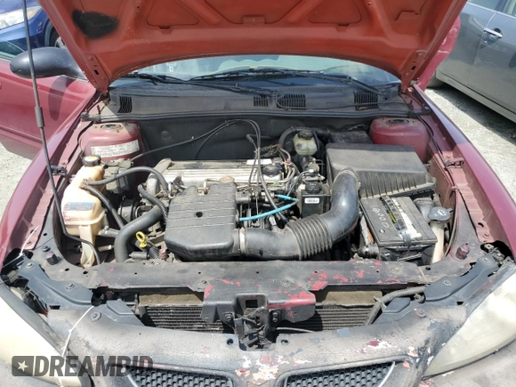 2004 Pontiac Grand Am SE z VIN 1G2NE52F34M596603, wystawiony jako Copart lot #57088665 z przebiegiem 213 295 mil mil oraz Szkoda całkowita • Salvage title. Historia ofert i sprzedaży dostępna na DreamBid. Obrazek 11.