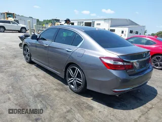 2016 Honda Accord Touring with VIN 1HGCR3F94GA009459, listed as a IAAI auction lot 42597128 with 182,977 mi miles and . Bid and sale history available at DreamBid. Image 3.