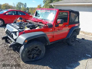 2015 Jeep Wrangler Sport with VIN 1C4AJWAG3FL606500, listed as a IAAI auction lot 40596072 with 110,344 mi miles. Bid and sale history available at carsss.com. Image 18.