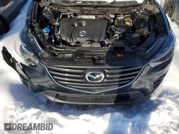 2016 Mazda CX-5 Grand Touring with VIN JM3KE4DY6G0655802, listed as a Copart auction lot 43820475 with 76,639 mi miles and Salvage Title. Bid and sale history available at carsss.com. Image 13.