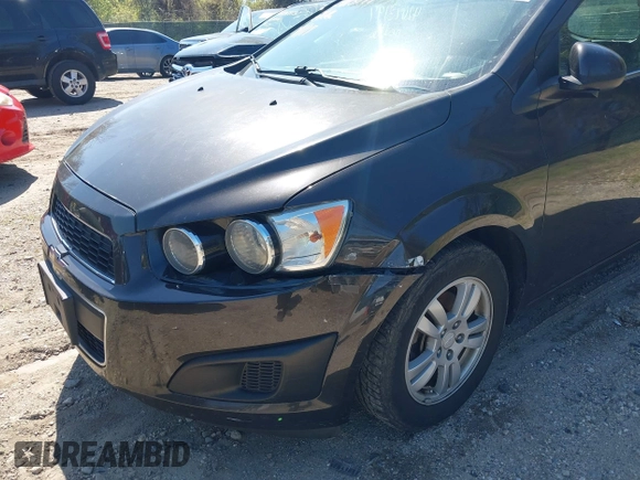 2014 Chevrolet Sonic LT with VIN 1G1JC6SB6E4210561, listed as a IAAI auction lot 42073197 with 100,945 mi miles. Bid and sale history available at carsss.com. Image 6.