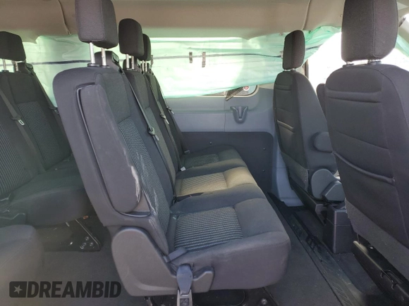 2019 Ford Transit Passenger XL z VIN 1FBZX2ZM5KKA77799, wystawiony jako Copart lot #86916184 z przebiegiem 152 833 mil mil oraz Szkody całkowita. Historia ofert i sprzedaży dostępna na DreamBid. Obrazek 11.