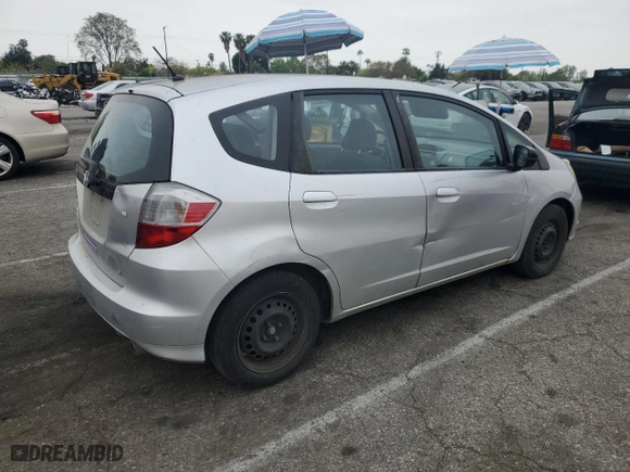2013 Honda Fit with VIN JHMGE8H39DC041808, listed as a Copart auction lot 52563975 with 127,074 mi miles and Salvage Title. Bid and sale history available at carsss.com. Image 3.