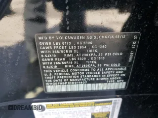 2012 Volkswagen Touareg Exec with VIN WVGEF9BP1CD011407, listed as a Copart auction lot 79199754 with 57,376 mi miles and Salvage Title. Bid and sale history available at DreamBid. Image 13.