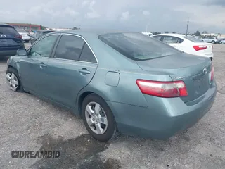 2007 Toyota Camry CE with VIN 4T1BE46K37U569515, listed as a IAAI auction lot 41974482 with 242,042 mi miles. Bid and sale history available at carsss.com. Image 3.