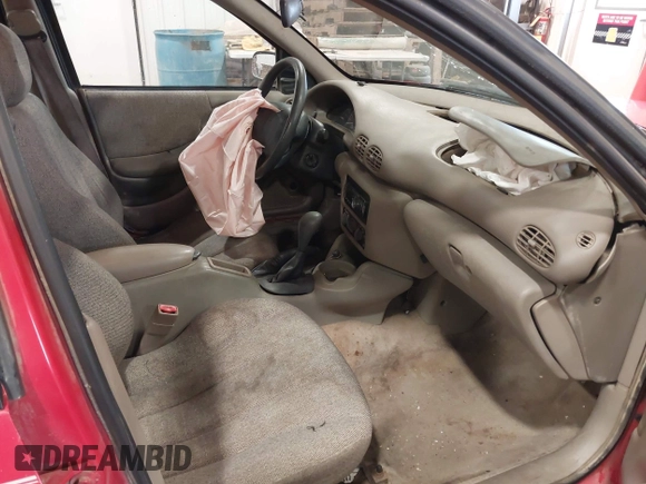 1999 Pontiac Sunfire SE z VIN 1G2JB524XX7547651, wystawiony jako IAAI lot #41962158 z przebiegiem 130 385 mil mil oraz . Historia ofert i sprzedaży dostępna na DreamBid. Obrazek 5.