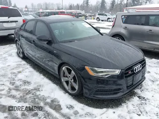2014 Audi S6 z VIN WAUF2BFC1EN094172, wystawiony jako IAAI lot #41571238 z przebiegiem 62 028 mil mil oraz . Historia ofert i sprzedaży dostępna na DreamBid. Obrazek 1.
