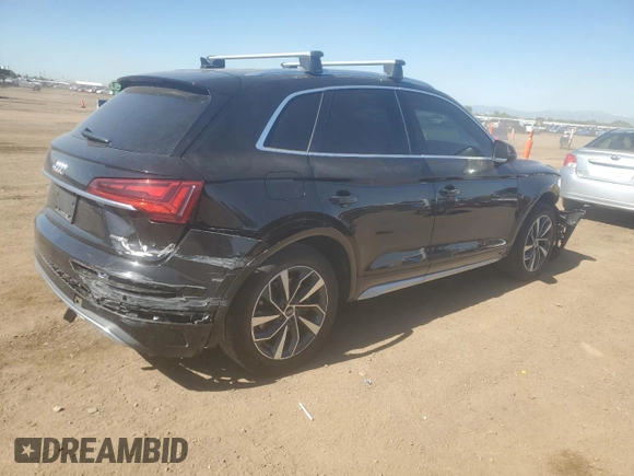 2021 Audi Q5 Premium Plus with VIN WA1BAAFYXM2015246, listed as a Copart auction lot 61257785 with 61,407 mi miles and Salvage title. Bid and sale history available at DreamBid. Image 3.