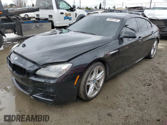 2014 BMW 6 Series 650i z VIN WBA6B2C5XED128959, wystawiony jako Copart lot #44201745 z przebiegiem 146 875 mil mil oraz Szkoda całkowita • Salvage title. Historia ofert i sprzedaży dostępna na DreamBid. Obrazek 1.