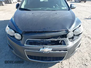 2014 Chevrolet Sonic LT with VIN 1G1JC6SGXE4132765, listed as a IAAI auction lot 41747782 with 144,485 mi miles. Bid and sale history available at carsss.com. Image 6.