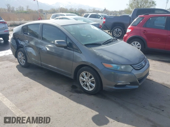 2010 Honda Insight EX with VIN JHMZE2H71AS032532, listed as a IAAI auction lot 41988221 with 333,144 mi miles and . Bid and sale history available at DreamBid. Image 1.