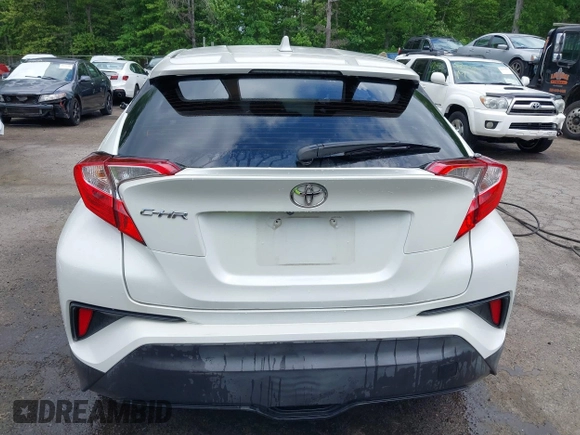 2019 Toyota C-HR XLE z VIN NMTKHMBX9KR095031, wystawiony jako IAAI lot #42191087 z przebiegiem 102 167 mil mil oraz . Historia ofert i sprzedaży dostępna na DreamBid. Obrazek 17.