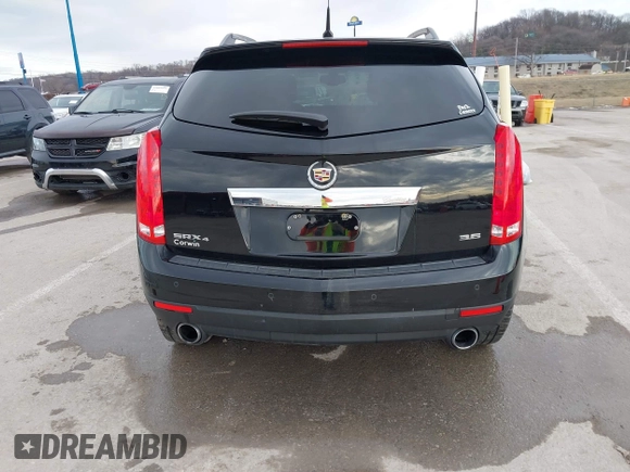2013 Cadillac SRX Performance Collection with VIN 3GYFNHE34DS595277, listed as a IAAI auction lot 41618126 with 118,141 mi miles. Bid and sale history available at carsss.com. Image 16.