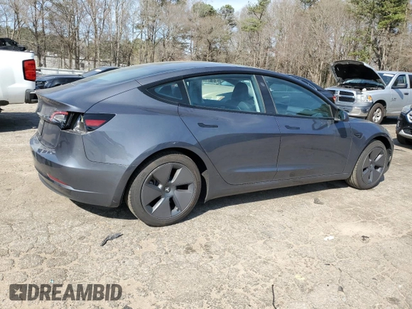 2023 Tesla Model 3 with VIN 5YJ3E1EA8PF699931, listed as a Copart auction lot 49293795 with 13,119 mi miles and Salvage Title. Bid and sale history available at DreamBid. Image 3.