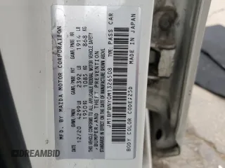 2021 Mazda 3 Premium Plus z VIN JM1BPBNY0M1326508, wystawiony jako Copart lot #83236614 z przebiegiem 66 686 mil mil oraz Szkoda całkowita • Salvage title. Historia ofert i sprzedaży dostępna na DreamBid. Obrazek 14.