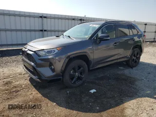 2019 Toyota RAV4 Hybrid XSE with VIN JTMEWRFV7KJ018715, listed as a Copart auction lot 63557145 with 86,519 mi miles and Salvage title. Bid and sale history available at DreamBid. Image 1.