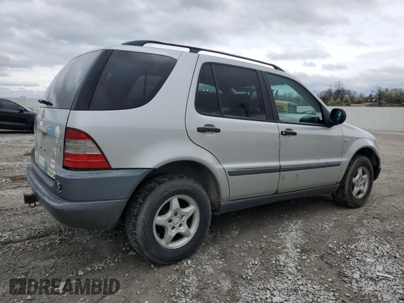 1999 Mercedes-Benz M 320/430/500 with VIN 4JGAB54E9XA127797, listed as a Copart auction lot 51408235 with 243,566 mi miles and Salvage title. Bid and sale history available at DreamBid. Image 3.