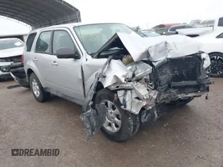 2011 Mazda Tribute Sport with VIN 4F2CY9C7XBKM01050, listed as a IAAI auction lot 41433870 with 122,287 mi miles and . Bid and sale history available at DreamBid. Image 1.